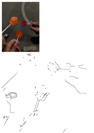 Close-up shows people holding star-shaped lollipops, including orange and pink treats, on a dark ground with a white line.